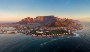 Aerial panoramic view of Cape Town cityscape at sunset, Western Cape Province, South Africa.